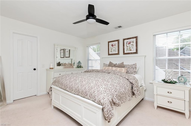 3009 Hogan Way, Suffolk, VA 23435 - bedroom with light colored carpet, ceiling fan, and baseboards