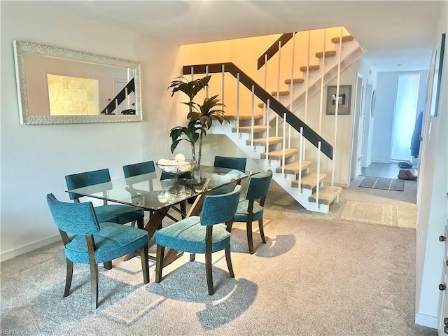 4402 Point W Dr, Portsmouth, VA 23703 - dining room featuring stairway and carpet flooring