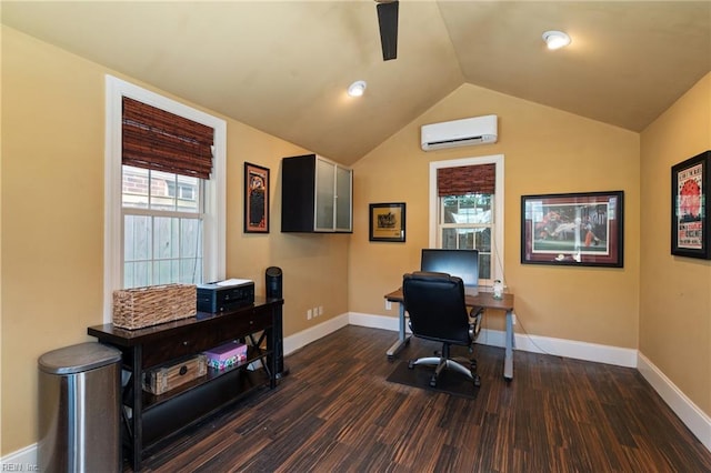 office featuring a wall unit AC, dark wood-type flooring, baseboards, lofted ceiling, and a ceiling fan