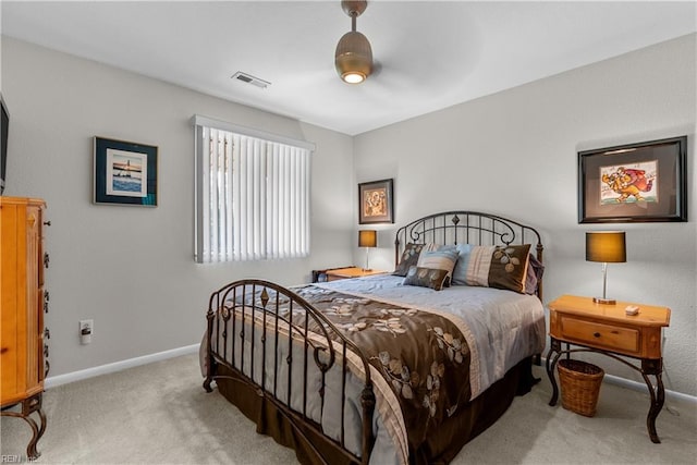 carpeted bedroom featuring baseboards