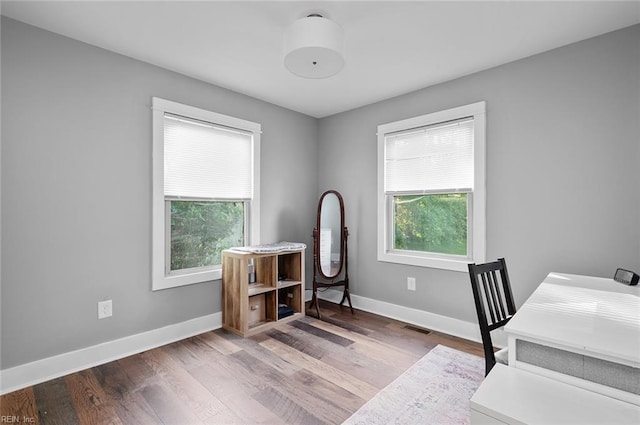 8209 Harlan Dr, Suffolk, VA 23436 - office area with wood finished floors and baseboards