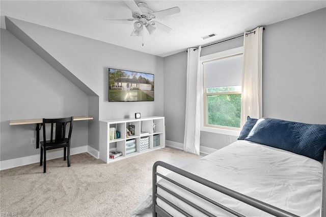 8209 Harlan Dr, Suffolk, VA 23436 - carpeted bedroom with baseboards, a textured ceiling, and ceiling fan