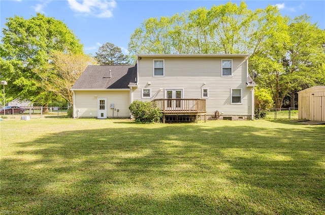 8209 Harlan Dr, Suffolk, VA 23436 - rear view of house featuring a wooden deck, a shed, an outbuilding, and french doors