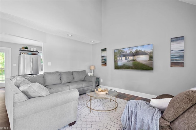 8209 Harlan Dr, Suffolk, VA 23436 - living area with wood finished floors and baseboards