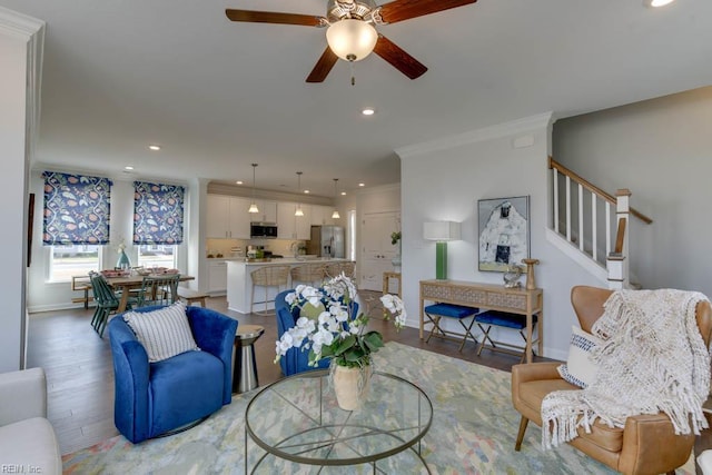 2234 Captiva Ln, Chesapeake, VA 23321 - living room with light wood-type flooring, recessed lighting, a ceiling fan, baseboards, and ornamental molding
