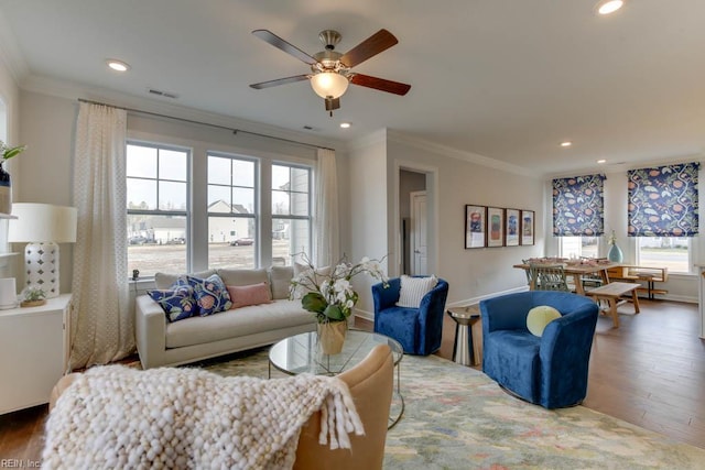 2234 Captiva Ln, Chesapeake, VA 23321 - living area featuring ornamental molding, healthy amount of natural light, wood finished floors, recessed lighting, and ceiling fan