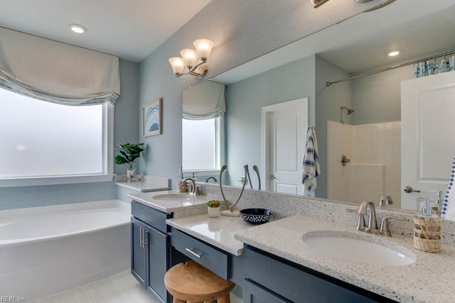 2234 Captiva Ln, Chesapeake, VA 23321 - full bathroom with healthy amount of natural light, a garden tub, vanity, a shower, and recessed lighting