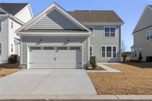 2234 Captiva Ln, Chesapeake, VA 23321 - view of front of home featuring concrete driveway, an attached garage, and central air condition unit