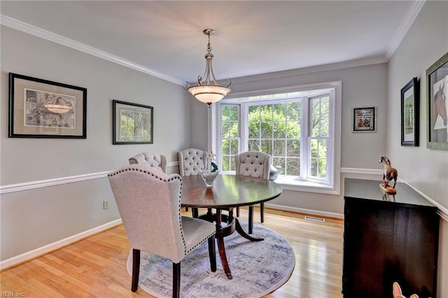 108 Devonshire Dr, Williamsburg, VA 23188 - dining space with baseboards, crown molding, and light wood finished floors