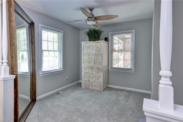 108 Devonshire Dr, Williamsburg, VA 23188 - unfurnished bedroom with multiple windows, carpet floors, baseboards, and ceiling fan