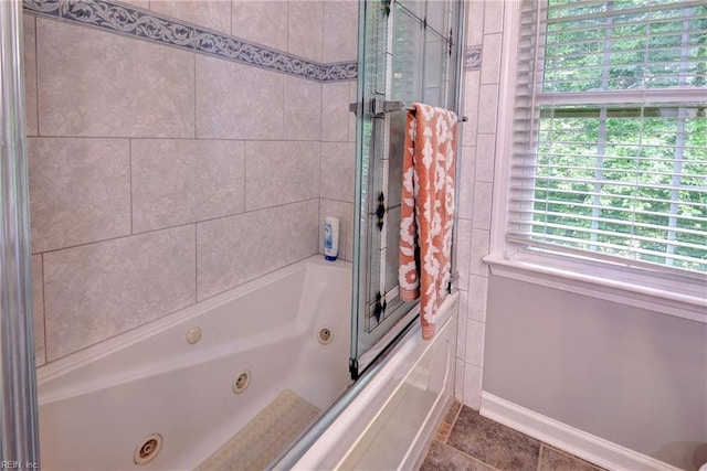 108 Devonshire Dr, Williamsburg, VA 23188 - bathroom with baseboards and a combined bath / shower with jetted tub