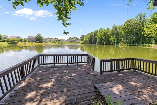dock area with a deck with water view