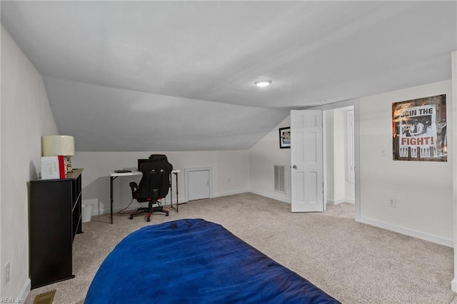 bedroom featuring carpet flooring, lofted ceiling, baseboards, and an office area