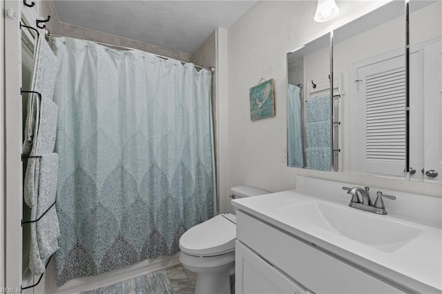 full bathroom with toilet, vanity, and a shower with curtain