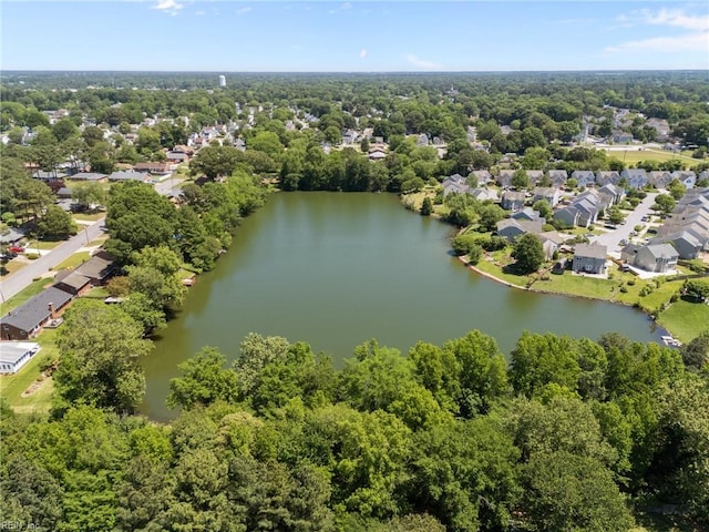 aerial perspective of suburban area featuring a nearby body of water