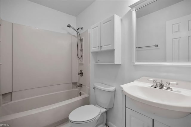 full bath featuring shower / washtub combination, toilet, and vanity