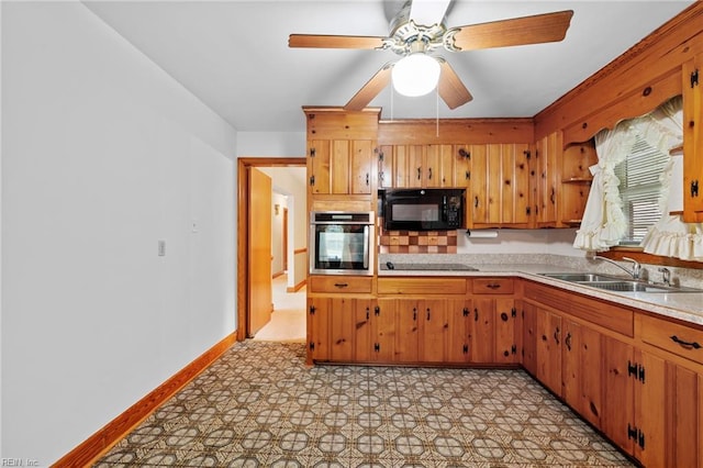 2916 Taylor Rd, Chesapeake, VA 23321 - kitchen featuring black appliances, a sink, light countertops, light flooring, and a ceiling fan