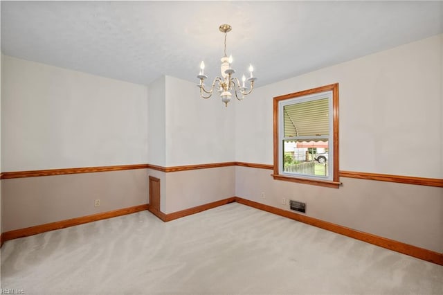 2916 Taylor Rd, Chesapeake, VA 23321 - empty room featuring light carpet, a chandelier, and baseboards