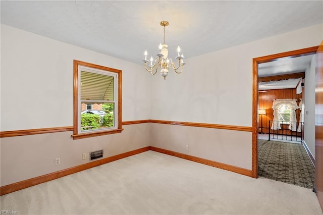 2916 Taylor Rd, Chesapeake, VA 23321 - carpeted spare room with a chandelier and baseboards