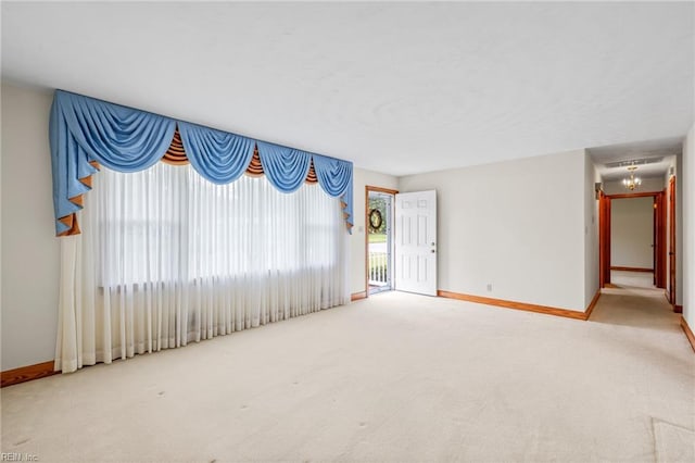 2916 Taylor Rd, Chesapeake, VA 23321 - unfurnished living room featuring carpet floors and baseboards