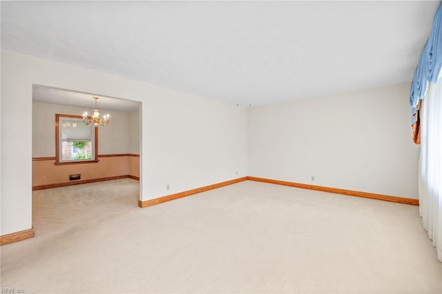 2916 Taylor Rd, Chesapeake, VA 23321 - empty room with a chandelier, light colored carpet, and baseboards