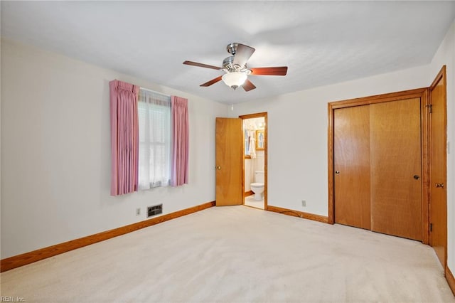 2916 Taylor Rd, Chesapeake, VA 23321 - unfurnished bedroom with baseboards, a closet, carpet, ensuite bath, and ceiling fan