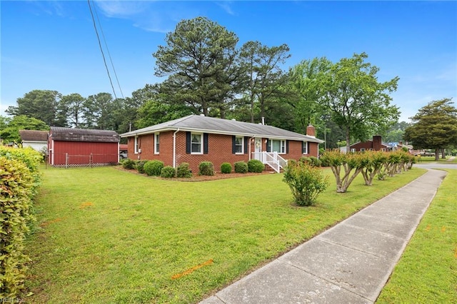 2916 Taylor Rd, Chesapeake, VA 23321 - ranch-style house featuring a front yard, a chimney, and brick siding