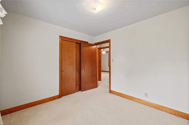 2916 Taylor Rd, Chesapeake, VA 23321 - unfurnished bedroom with light carpet, baseboards, and a closet