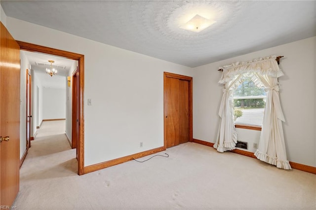 2916 Taylor Rd, Chesapeake, VA 23321 - unfurnished bedroom with light colored carpet, a closet, and baseboards