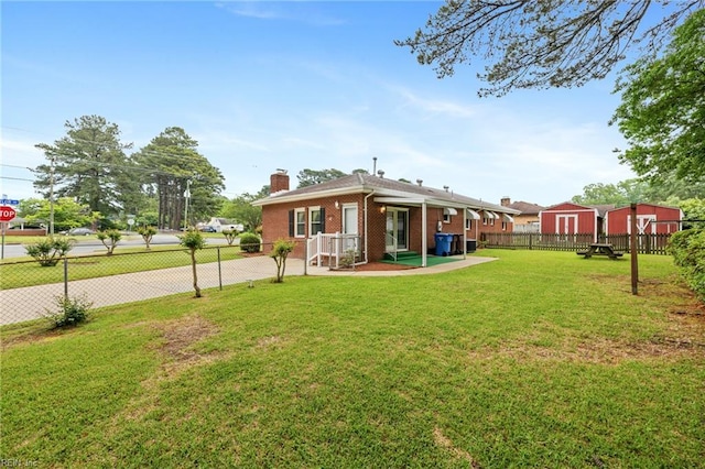 2916 Taylor Rd, Chesapeake, VA 23321 - back of property with a chimney and brick siding