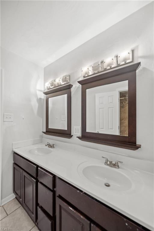 5607 Dodington Ct, Virginia Beach, VA 23462 - full bath featuring double vanity and tile patterned floors