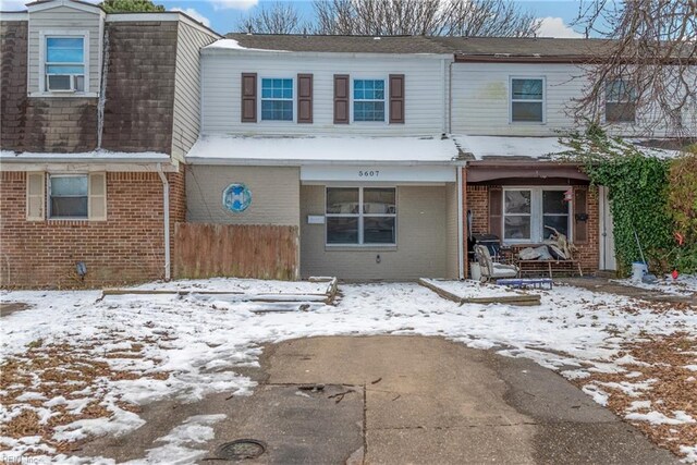 5607 Dodington Ct, Virginia Beach, VA 23462 - view of front of home featuring brick siding, mansard roof, and cooling unit