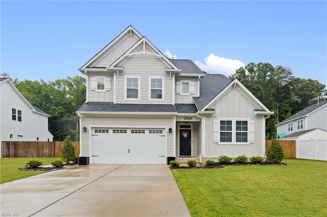 2349 Treesong Trl, Virginia Beach, VA 23456 - craftsman-style home featuring driveway, a garage, board and batten siding, and roof with shingles