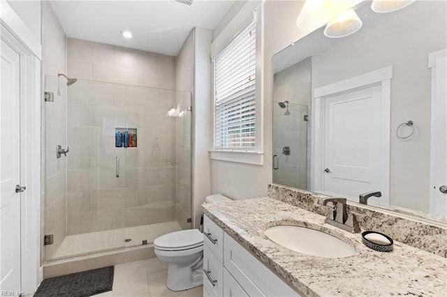 2349 Treesong Trl, Virginia Beach, VA 23456 - bathroom featuring tile patterned flooring, a stall shower, toilet, and vanity