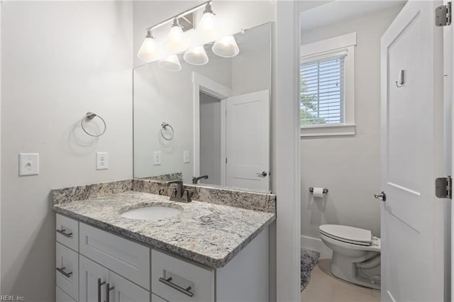 2349 Treesong Trl, Virginia Beach, VA 23456 - bathroom with toilet, vanity, and baseboards