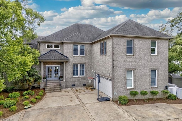 2509 Lone Pine Pt, Virginia Beach, VA 23451 - view of front of property with french doors, an attached garage, brick siding, crawl space, and driveway