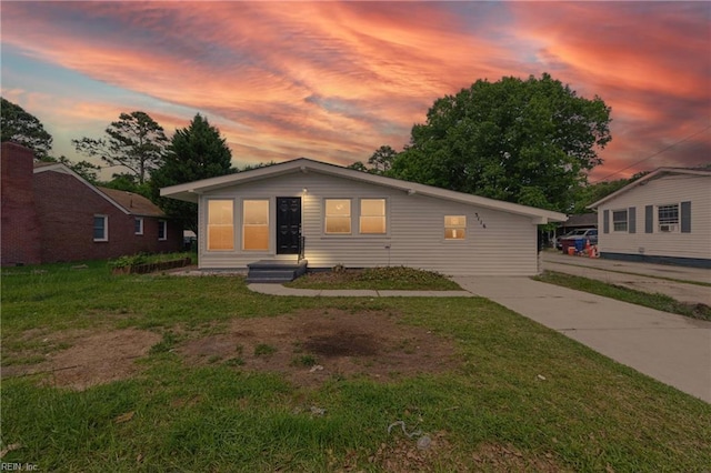 bungalow with a front lawn