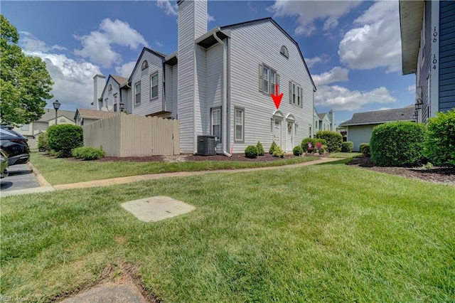 100 Castilian Dr, Virginia Beach, VA 23462 - view of side of home featuring a chimney, central air condition unit, and a residential view