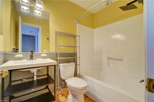 100 Castilian Dr, Virginia Beach, VA 23462 - bathroom featuring toilet, shower / washtub combination, and wood finished floors