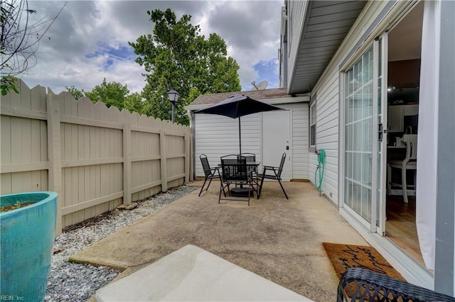 100 Castilian Dr, Virginia Beach, VA 23462 - view of patio with fence and outdoor dining area