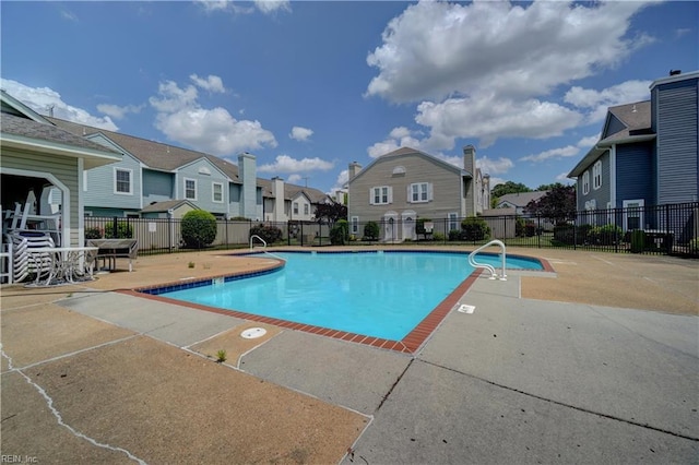 100 Castilian Dr, Virginia Beach, VA 23462 - community pool featuring a residential view, a patio area, and fence