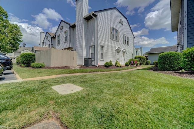 100 Castilian Dr, Virginia Beach, VA 23462 - view of side of property featuring a chimney, central air condition unit, and a residential view