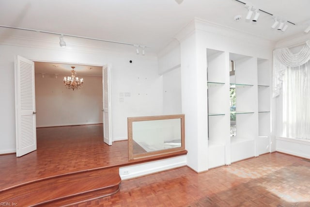 6025 River Rd, Norfolk, VA 23505 - spare room with track lighting, a chandelier, baseboards, and a smoke detector