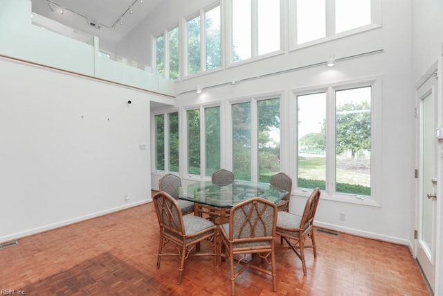 6025 River Rd, Norfolk, VA 23505 - sunroom / solarium featuring healthy amount of natural light and rail lighting