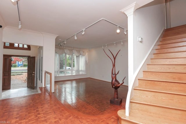 6025 River Rd, Norfolk, VA 23505 - entrance foyer featuring track lighting, stairs, and baseboards