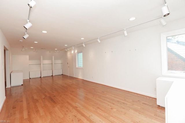 6025 River Rd, Norfolk, VA 23505 - spare room with rail lighting, light wood-type flooring, baseboards, and recessed lighting
