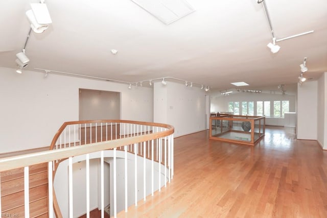 6025 River Rd, Norfolk, VA 23505 - hall featuring track lighting, an upstairs landing, and light wood finished floors