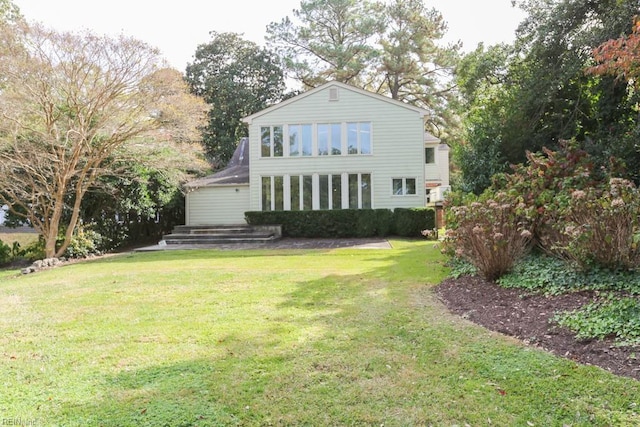 6025 River Rd, Norfolk, VA 23505 - back of house with a lawn