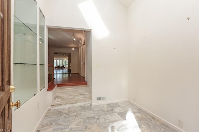 6025 River Rd, Norfolk, VA 23505 - hallway with marble finish floors and baseboards
