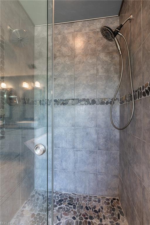 bathroom with a stall shower